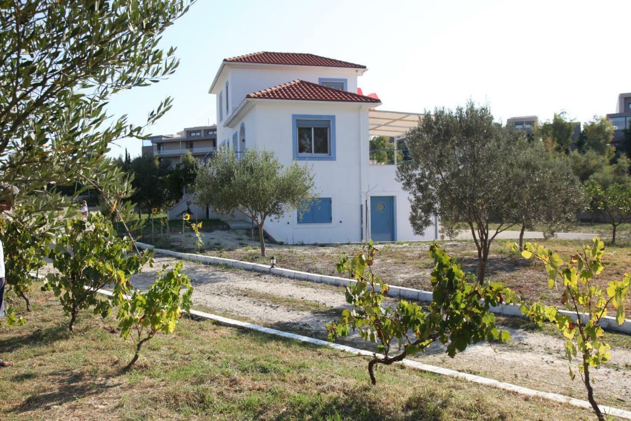 Romanos XI Xi Beach Exterior photo